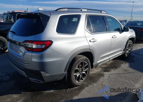 2024 Honda Pilot Touring z USA, uszkodzony, nr VIN 5FNYG2H77RB004203